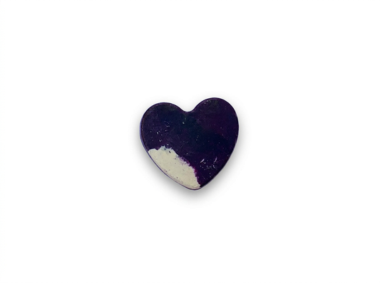 Handmade heart-shaped Waxadoodle crayon in deep purple with a white swirl