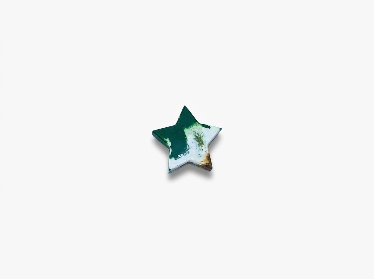 Handmade star-shaped Waxadoodle crayon with swirled colors
