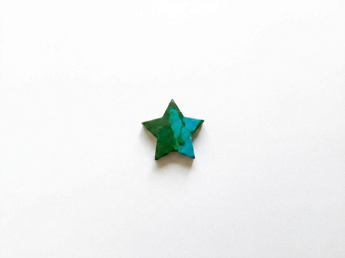 Handmade star-shaped Waxadoodle crayon with swirled colors
