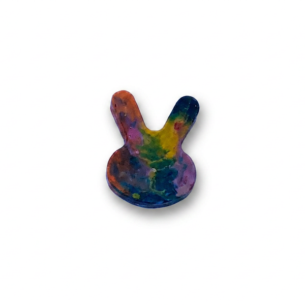 Handmade bunny-shaped Waxadoodle crayon with rainbow colors swirled together