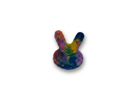 Handmade bunny-shaped Waxadoodle crayon with rainbow colors swirled together